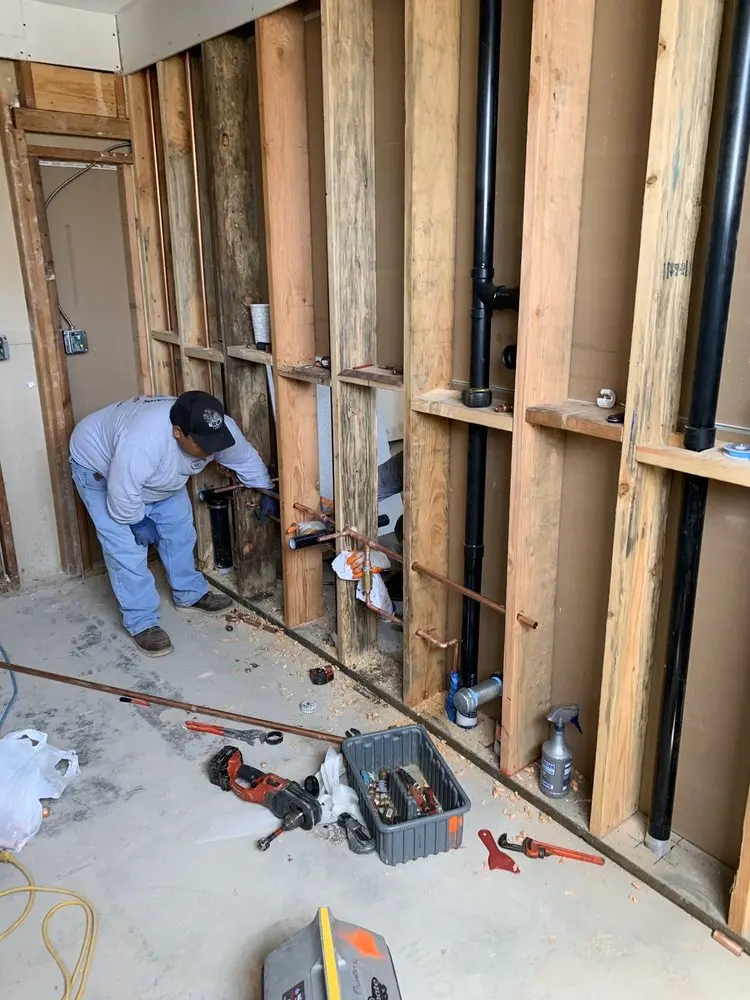 Commercial rough-in plumbing for Water Heater Replacement in Clemens and Munsinger Gardens